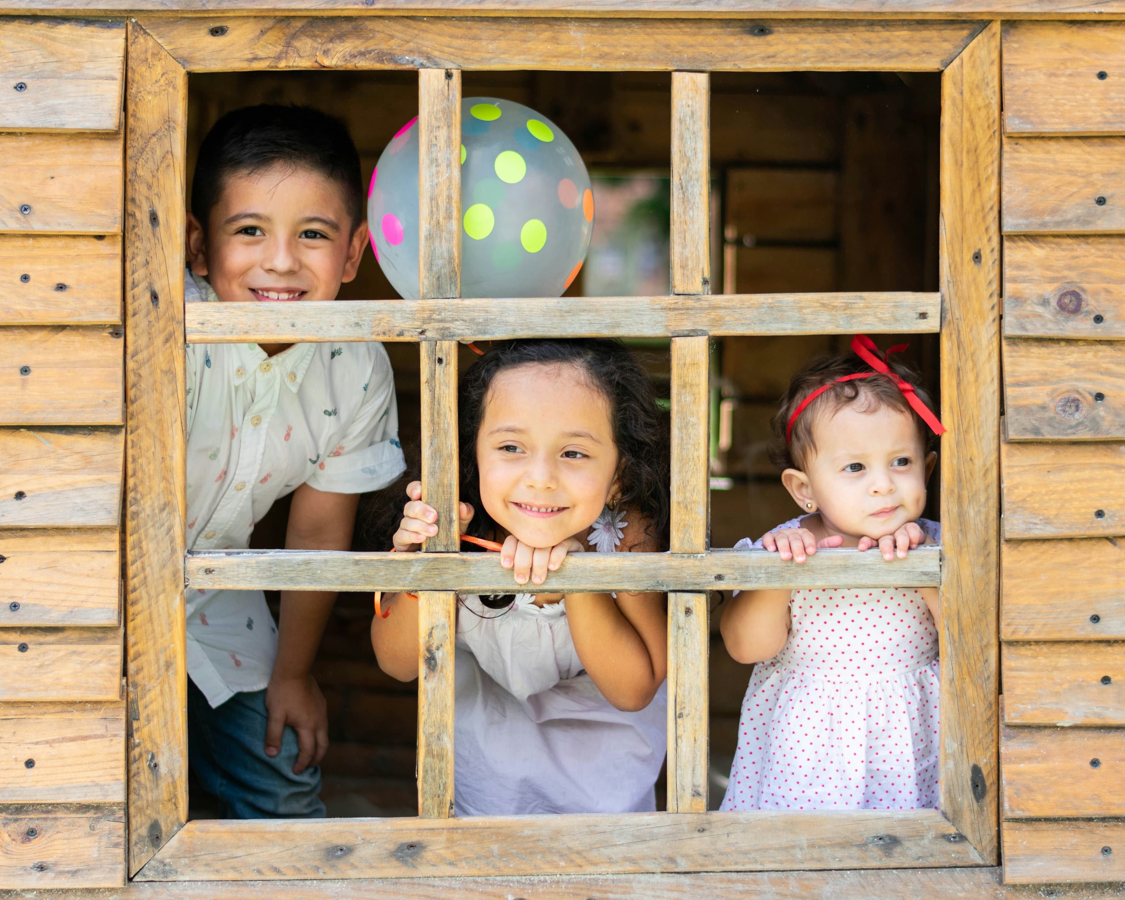 children at a window